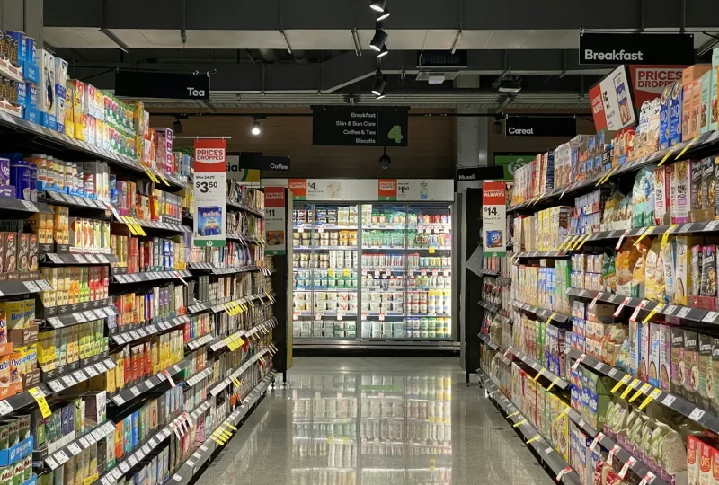 Aisle of stocked shelves in a retail store