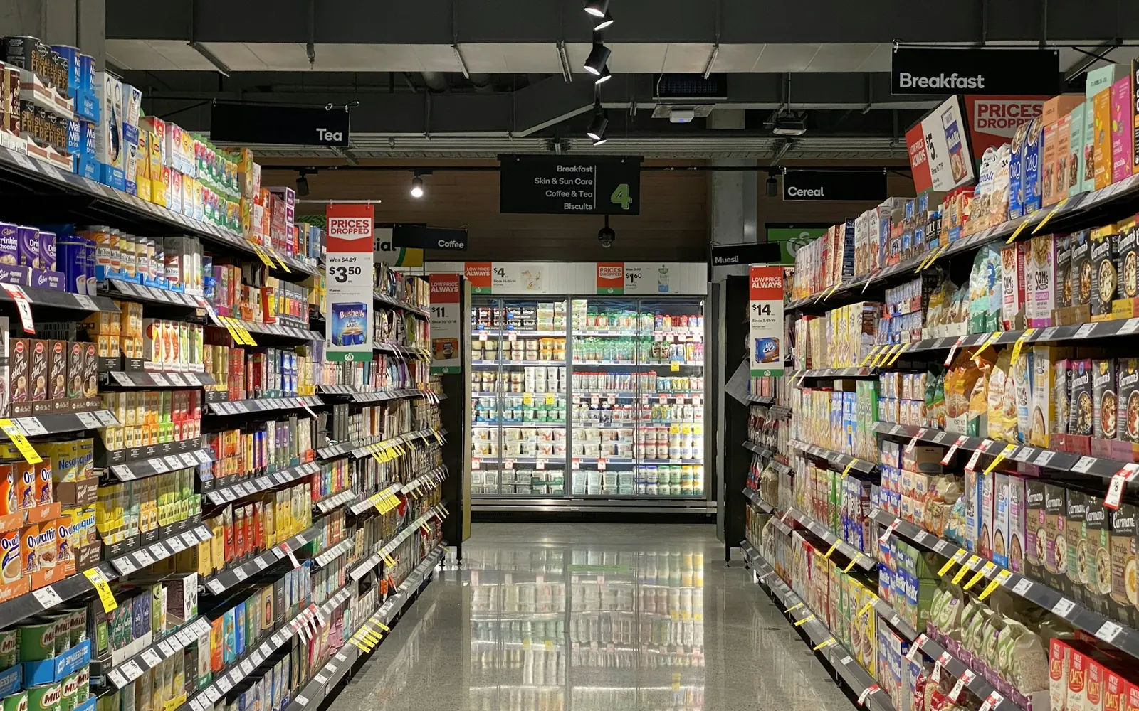 Aisle of stocked shelves in a retail store