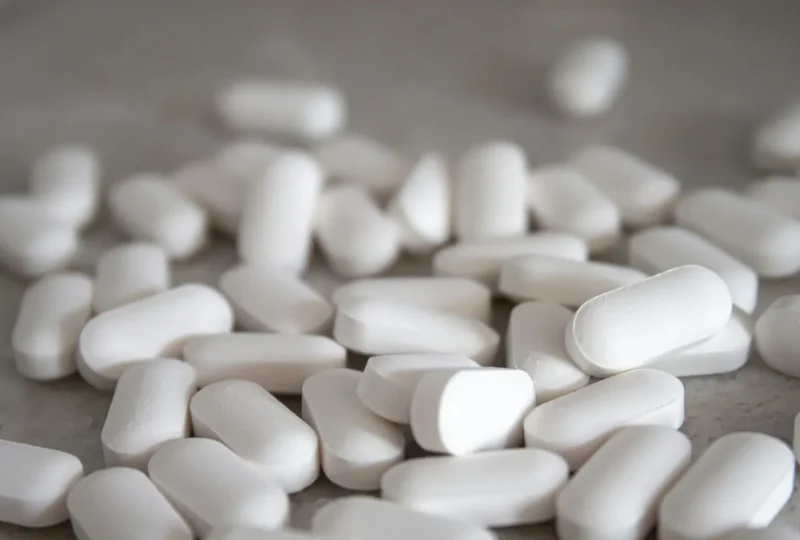 Close-up of white tablets on a table